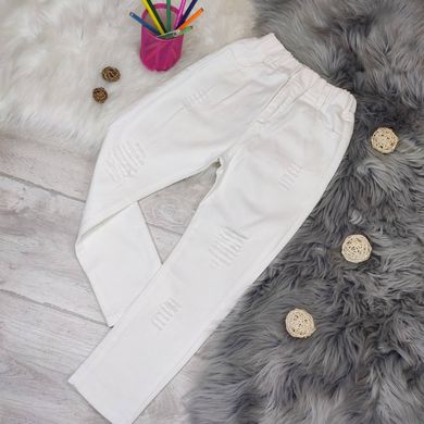 Белые котоновые штаны с потертостями